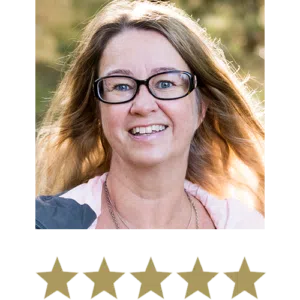 Fat Burner™ 9 Middle-Aged Woman wearing glasses smiling with five stars beneath