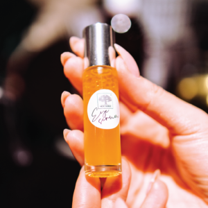 Herbal Schools 42 Hand holding small New Nordic bottle.